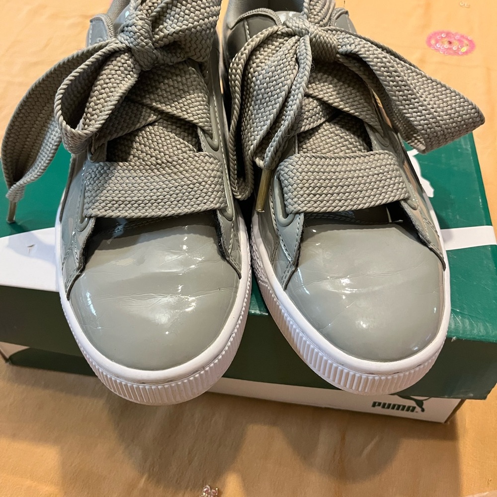 Puma Basket Heart Patent sneakers in an "Iron" (grey) colorway.